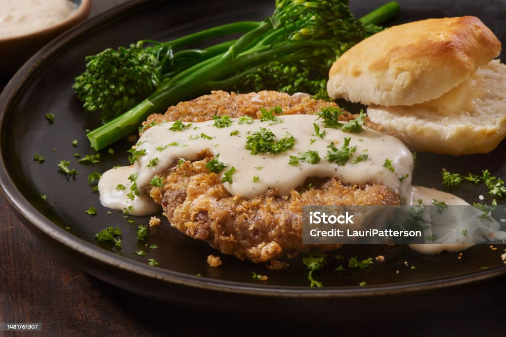Chicken Fried Steaks with Country Style Gravy, Broccolini and a Biscuit